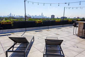 Shared roof deck with city views